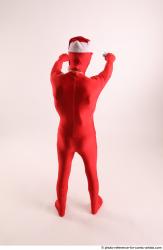 JOEL_ADAMSON CHRISTMAS VILLAIN WITH TWO GUNS